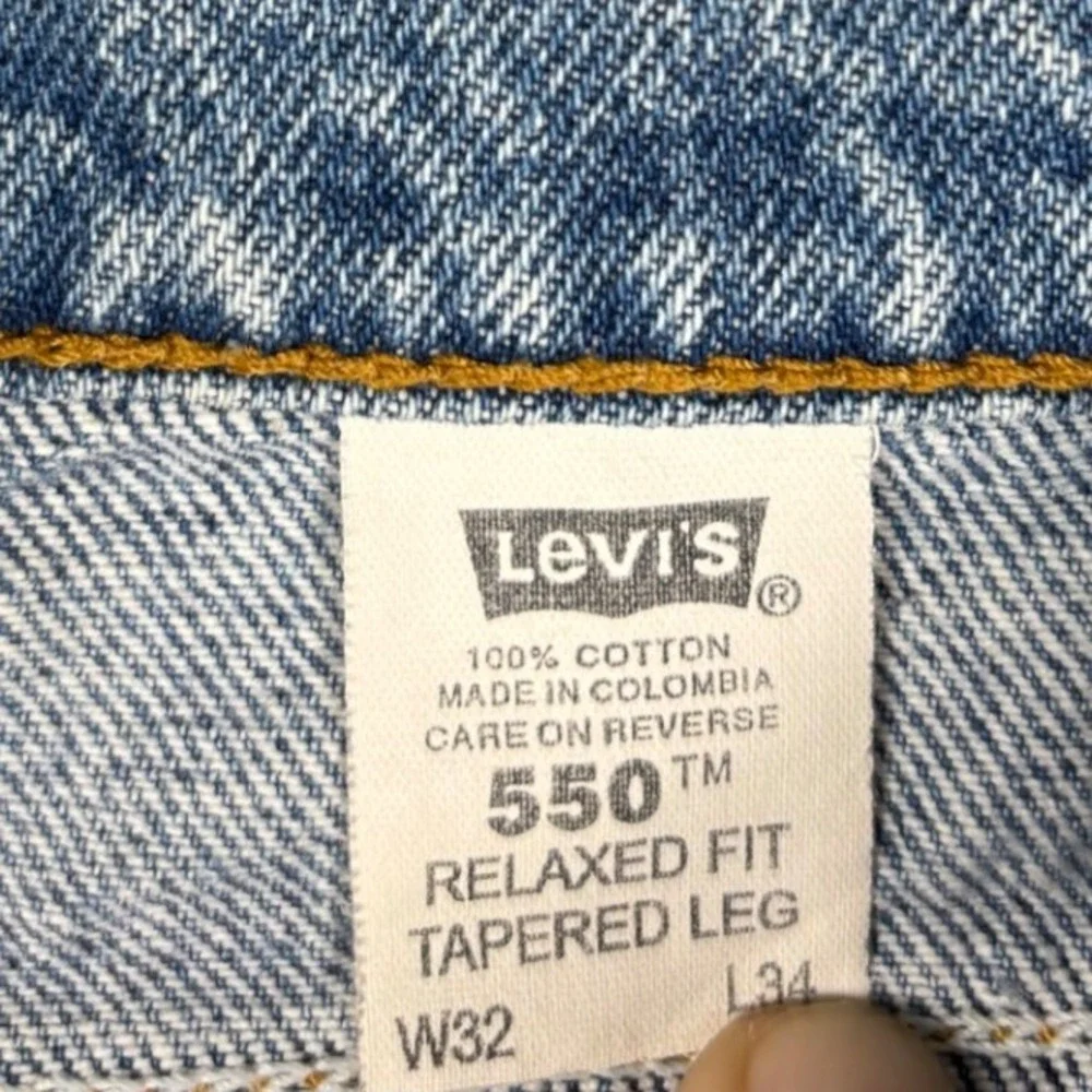 VTG‎ Levi's 550 Relaxed Fit Tapered Leg Orange Tab Jeans 32x33 Light Wash Blue
